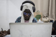 May Fall, 17 years-old , composes a music at a beat making class for women in Dakar, Senegal, Wednesday, Aug. 14, 2024. (AP Photo/Annika Hammerschlag)