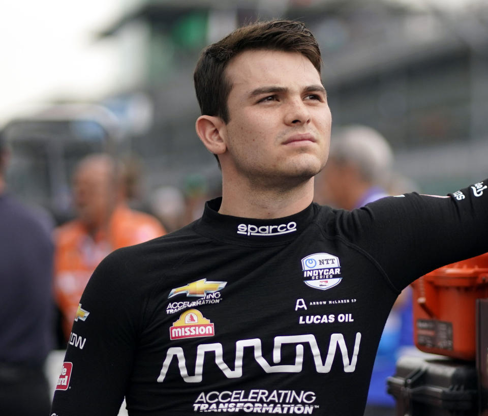 FILE - Pato O'Ward, of Mexico, waits during qualifications for the Indianapolis 500 auto race at Indianapolis Motor Speedway, May 21, 2022, in Indianapolis. The IndyCar season begins Sunday, March 5, 2023, with the Grand Prix of St. Petersburg.AP Photo/Darron Cummings, File)