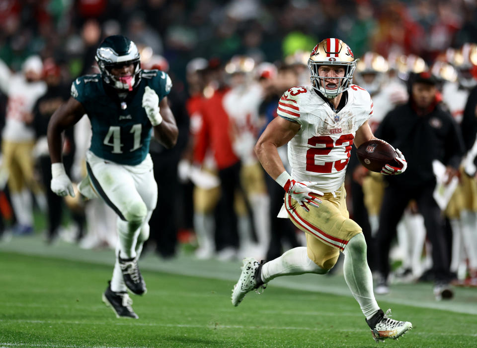 PHILADELPHIA, PENNSYLVANIA – DECEMBER 03: <a class="link " href="https://sports.yahoo.com/nfl/players/30121" data-i13n="sec:content-canvas;subsec:anchor_text;elm:context_link" data-ylk="slk:Christian McCaffrey;sec:content-canvas;subsec:anchor_text;elm:context_link;itc:0">Christian McCaffrey</a> #23 of the San Francisco 49ers runs the ball after a catch during the third quarter in the game against the Philadelphia Eagles at Lincoln Financial Field on December 03, 2023 in Philadelphia, Pennsylvania. (Photo by Tim Nwachukwu/Getty Images)