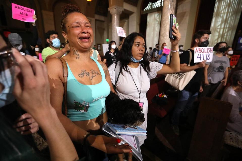 "I just want help," said a crying Tanesha Haynes who is homeless and joined advocates and protesters