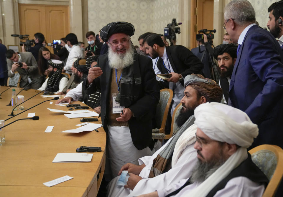 Members of the political delegation from the Afghan Taliban's movement attend talks involving Afghan representatives in Moscow, Russia, Wednesday, Oct. 20, 2021. Russia invited the Taliban and other Afghan parties for talks voicing hope they will help encourage discussions and tackle Afghanistan's challenges. (AP Photo/Alexander Zemlianichenko, Pool)