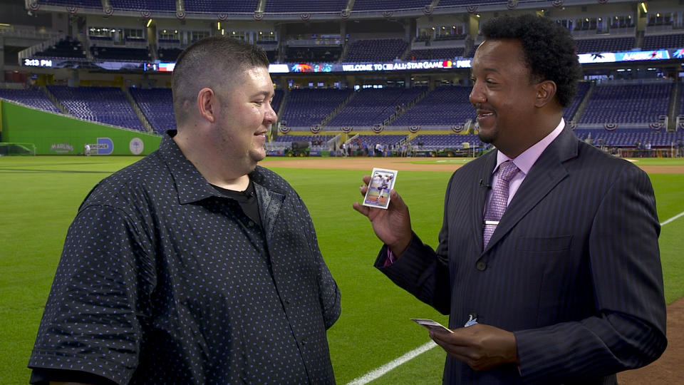 Pedro Martinez with his brother Ramon’s baseball card from 1992. (Yahoo Sports)