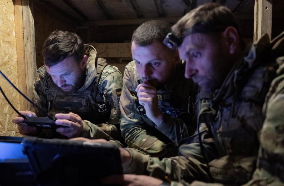 Servicemen of the ‘Achilles’ Battalion from the 92nd Assault Brigade of the Ukrainian army control a Vampire hexacopter drone during a mission flight over a front line near Chasiv Yar (AFP via Getty)