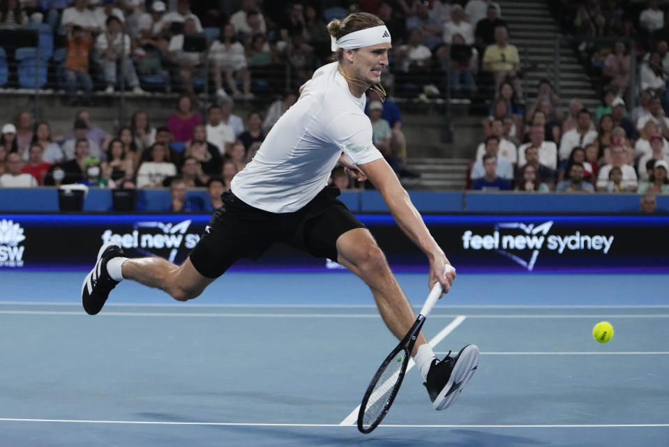 Germany's Alexander Zverev plays a forehand return to Poland's Hubert Hurkacz during the final of the United Cup in Sydney, Australia, Sunday, Jan. 7, 2024. (AP Photo/Mark Baker)