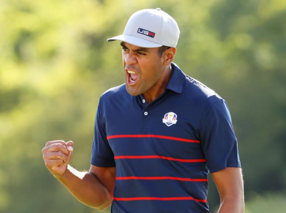 Tony Finau celebrates during a one-sided victory over McIlroy and Shane Lowry (Getty Images)