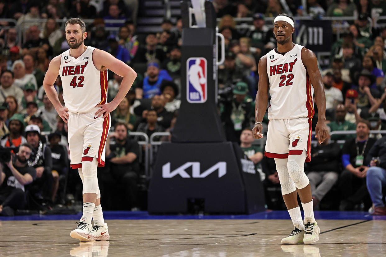 Kevin Love (left) and Jimmy Butler picked up the slack after Tyler Herro's injury. (Photo by Stacy Revere/Getty Images)