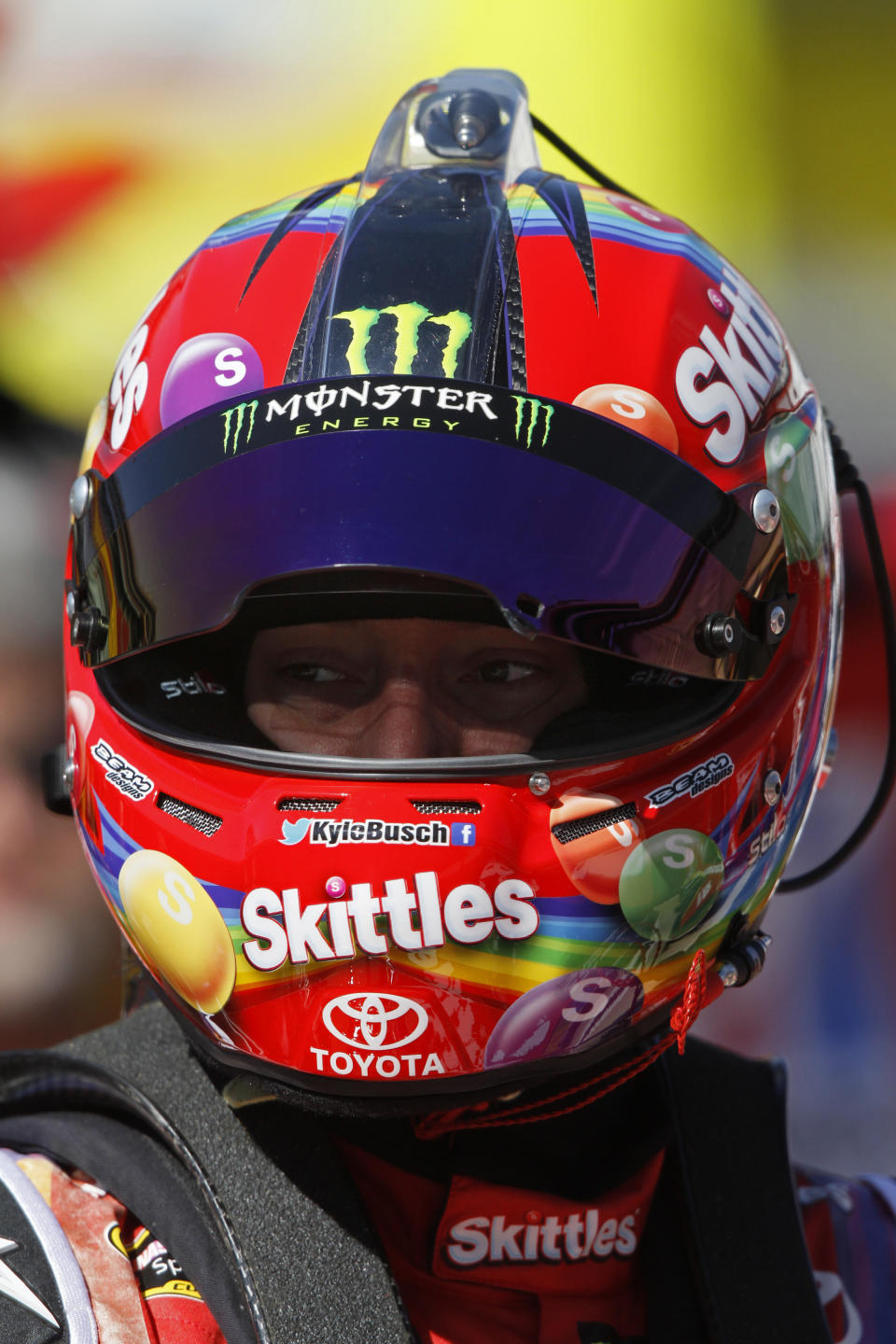 Driver Kyle Busch (18) waits during practice for the NASCAR Sprint Cup series auto race at Bristol Motor Speedway on Friday, March 14, 2014, in Bristol, Tenn. (AP Photo/Wade Payne)