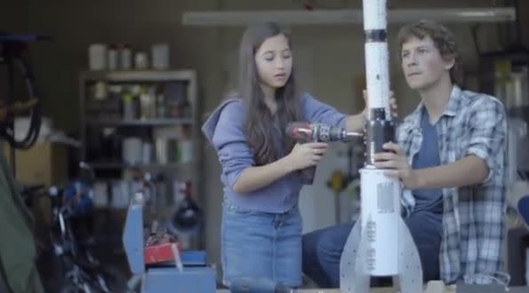 A commercial created by Verizon was shared all over the Internet in June. The video shows one girl's development from toddler to teenager. She wanders curiously through nature, examines the plants and animals around her, creates an astronomy project, and builds a rocket with her older brother. But all along the way, she hears many all-too-common refrains from her parents: "Who's my pretty girl?" "Don't get your dress dirty," "You don't want to mess with that," and "Be careful with that. Why don't you hand that to your brother?" These statements are subtle, but the ad suggests that they can ultimately discourage girls from pursuing traditionally male-dominated STEM subjects in school. <a href="http://www.huffingtonpost.com/2014/06/24/verizon-ad-tells-parents-to-encourage-girls_n_5526236.html" target="_blank">Watch the full commercial here</a>. 