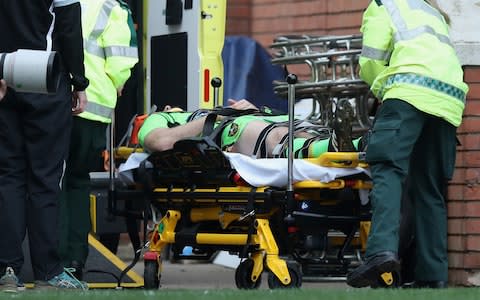 Rob Horne is stretchered from the pitch - Credit: Getty images