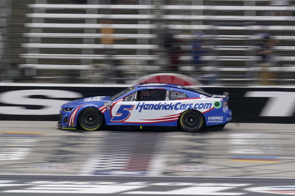 Kyle Larson (5) crosses the start/finish line during qualifying for the NASCAR All-Star Race auto race at Texas Motor Speedway in Fort Worth, Texas, Saturday, May 21, 2022. (AP Photo/LM Otero)