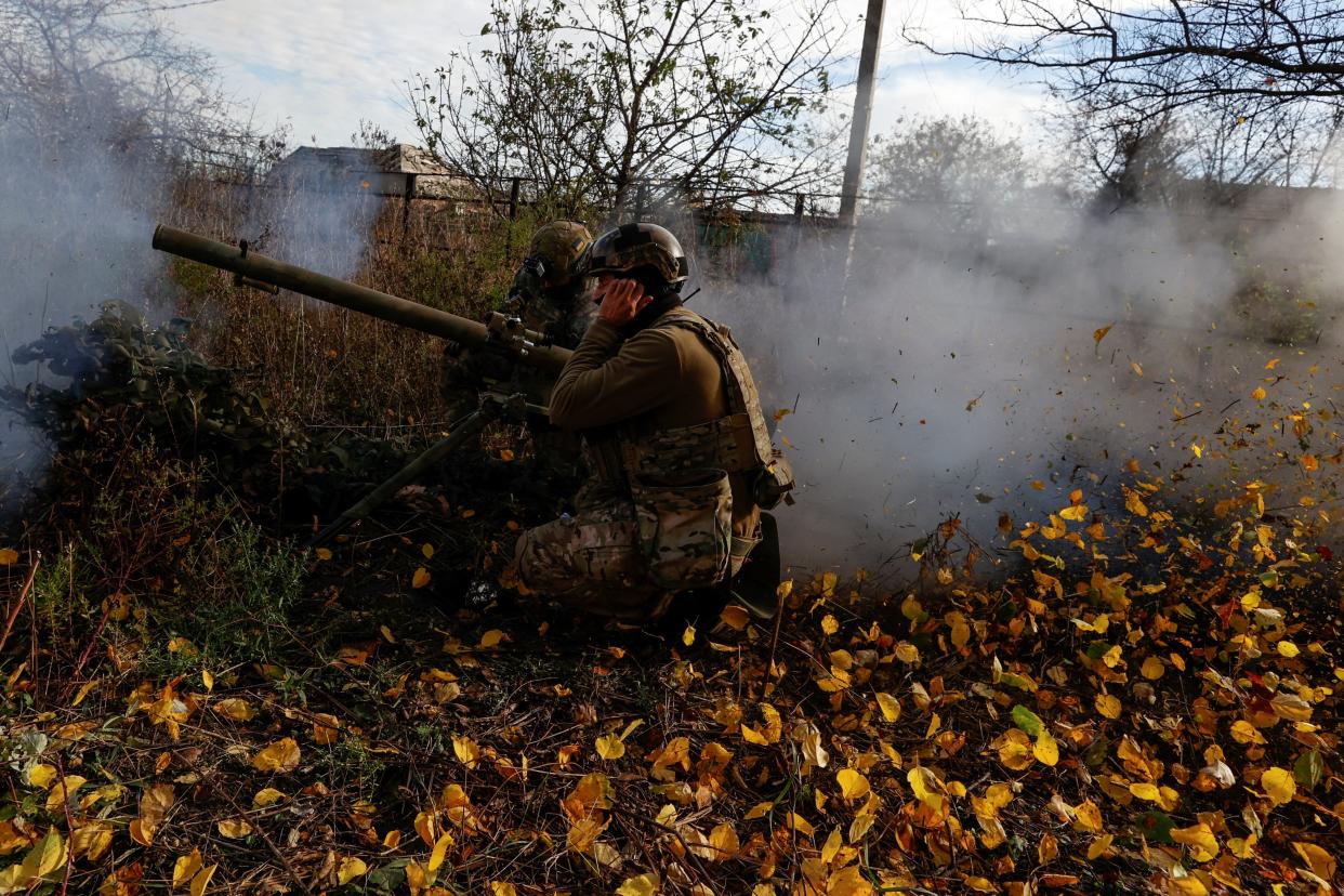 Members of Ukraine's National Guard Omega Special Purpose fire a SPG-9 anti-tank grenade launcher toward Russian troops in the front line town of Avdiivka last week (REUTERS)