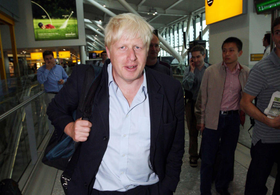 London Mayor Boris Johnson leaves Heathrow Airport's Terminal 5 heading to Beijing for the closing ceremony of the 2008 Olympic games where the flag is then passed on to London.