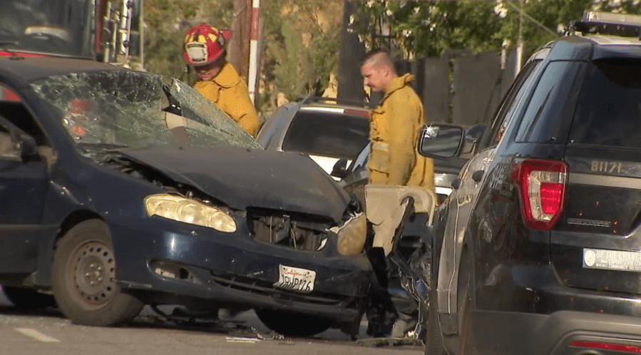 3 hospitalized, including 2 officers, after crash involving L.A. police`