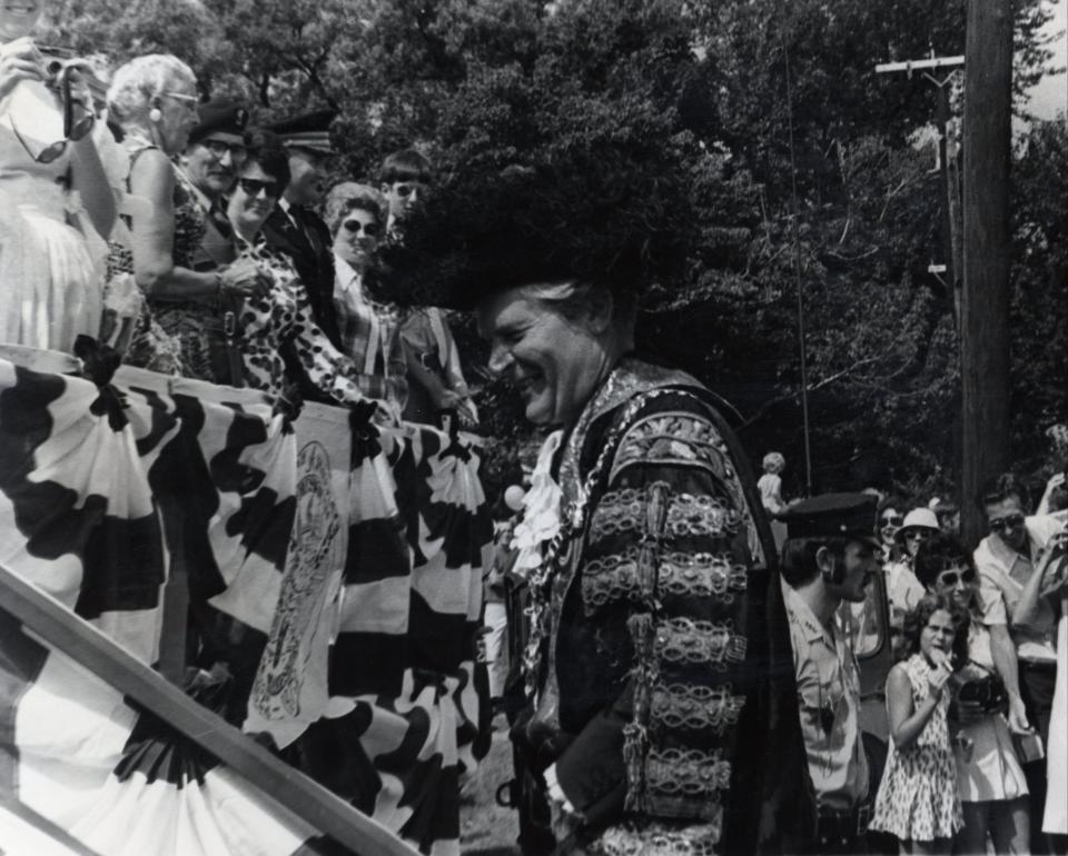 Portsmouth, England's Lord Mayor John P.N. Brogden attended a number of Portsmouth, N.H.'s anniversary events in August 1973. Here he enters the reviewing stand for the city's 350th parade.