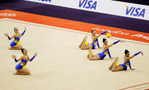 LONDON, ENGLAND - JANUARY 18: The Great Britain team in action in the Group All-Around during the FIG Rhythmic Gymnastics Olympic Qualification round at North Greenwich Arena on January 18, 2012 in London, England. (Photo by Paul Gilham/Getty Images)