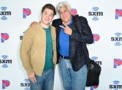 Adam DeVine and Jay Leno stop for a photo at the SiriusXM Hollywood studios in L.A. on Wednesday.
