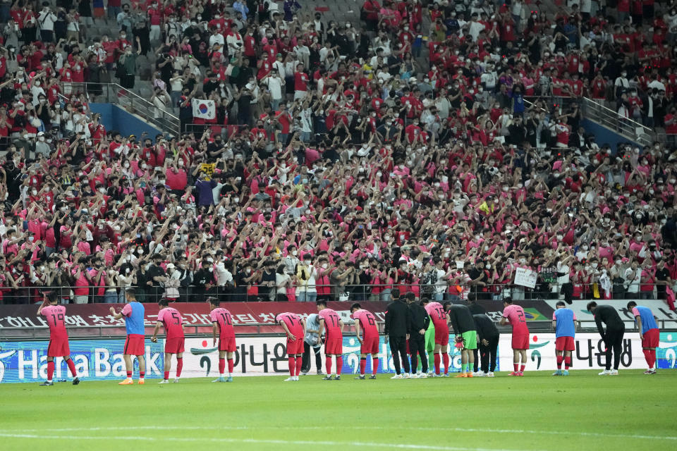 South Korean players bow at supporters after their friendly soccer match against Brazil at Seoul World Cup Stadium in Seoul, South Korea, Thursday, June 2, 2022. Brazil won the match 5-1. (AP Photo/Lee Jin-man)