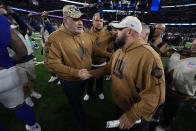 Dallas Cowboys head coach Mike McCarthy, left, and New York Giants head coach Brian Daboll, right, shake hands after their NFL football game, Sunday, Nov. 12, 2023, in Arlington, Texas. (AP Photo/Julio Cortez)