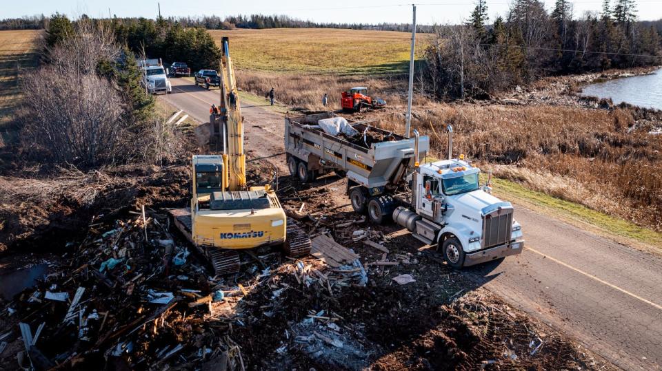 The cottages and debris had been along the Campbellton Road since post-tropical storm Fiona, more than ten weeks after the storm.