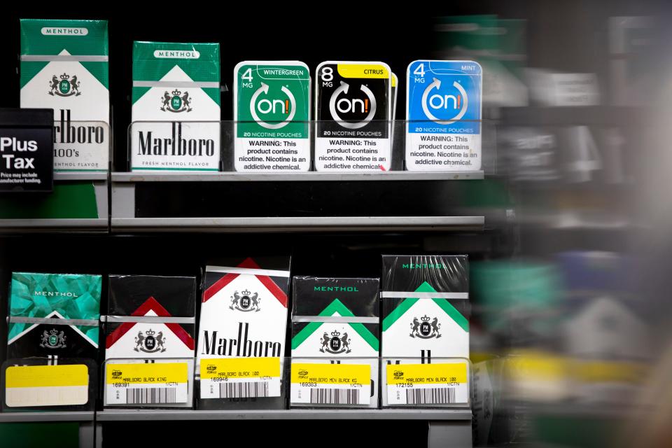 Cigarette packs, including menthol, are displayed for sale at a convenience store in Lower Price Hill on Wednesday, May 11, 2022.