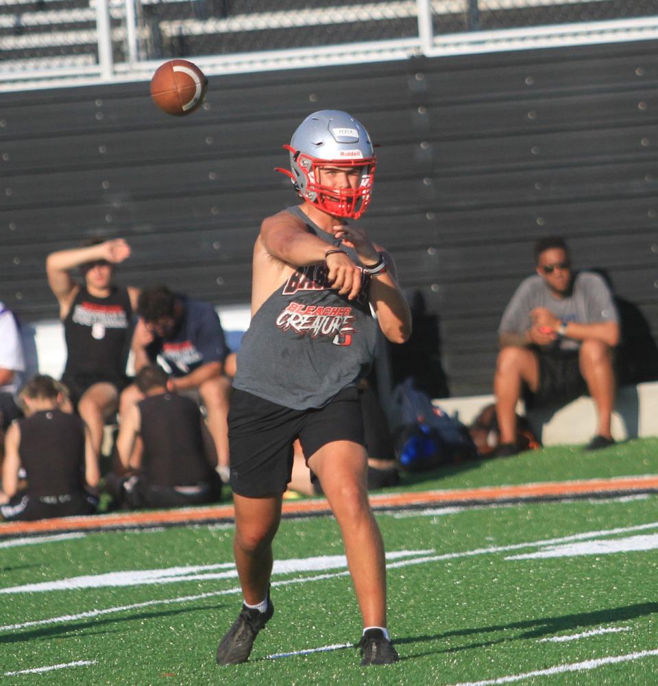 Utica's Hayden Piper throws during a passing scrimmage competition at New Lexington on Friday, July 14, 2023.