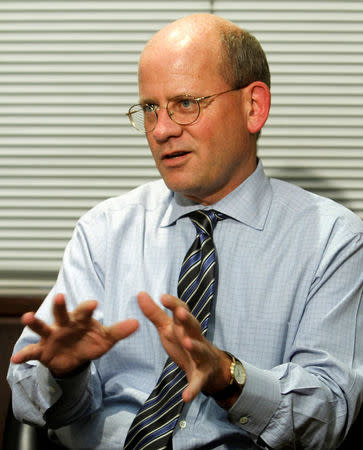 FILE PHOTO - General Electric Co India's chief executive John Flannery reacts during an interview with Reuters in New Delhi on March 31, 2011. REUTERS/B Mathur/File Photo