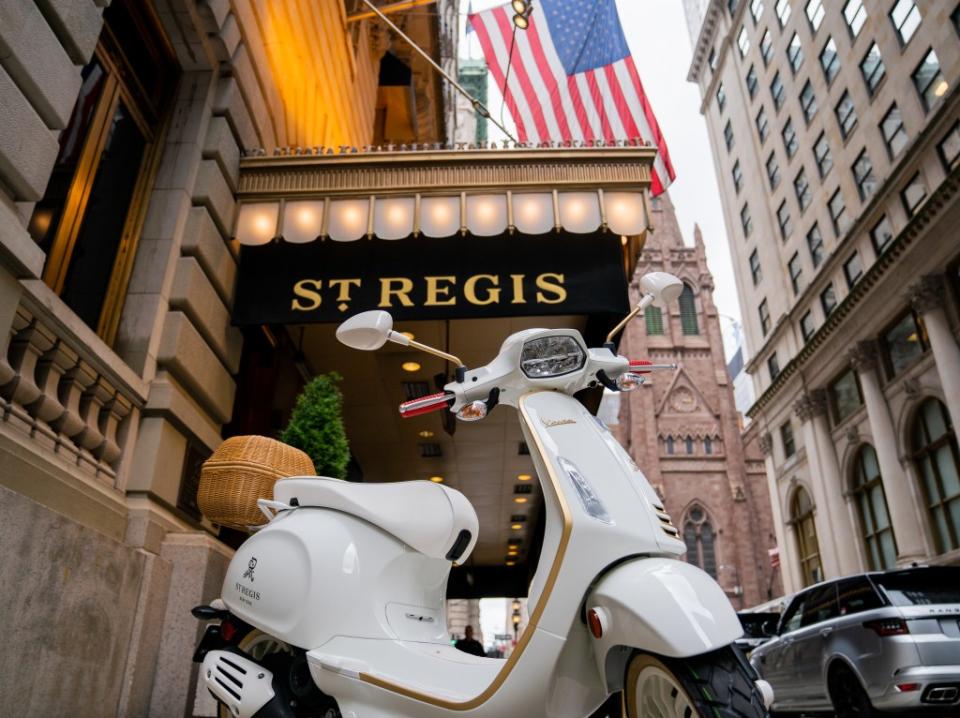 Known for its ritual sabering of a bottle of Champagne every night at dusk, the St. Regis is now taking its tradition on the road via Vespa. Courtesy of the St. Regis