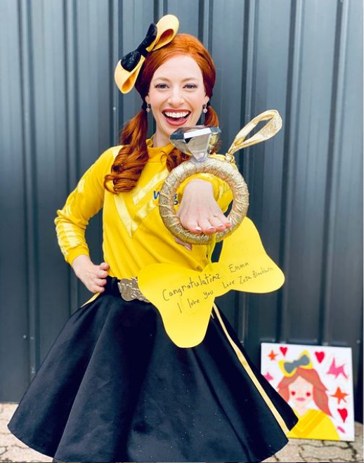 Emma Watkins holding out a giant ring