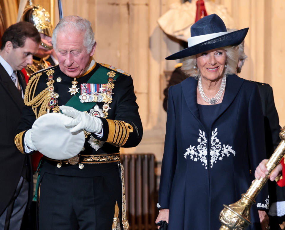 The Duchess of Cornwall wore a co-ordinating navy raffia hat for the ceremonious occasion. (Getty Images)