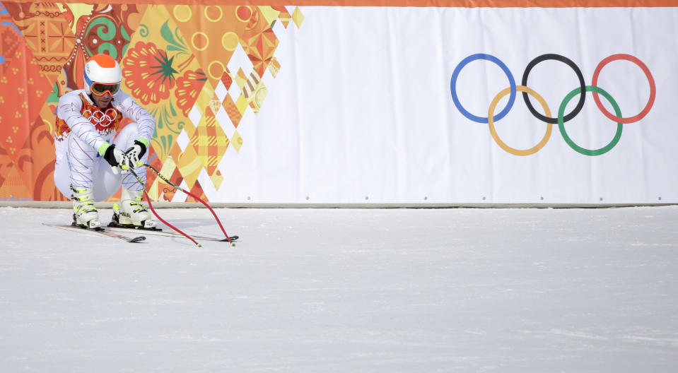 United States' Bode Miller reacts after finishing the men's downhill at the Sochi 2014 Winter Olympics, Sunday, Feb. 9, 2014, in Krasnaya Polyana, Russia. (AP Photo/Gero Breloer)