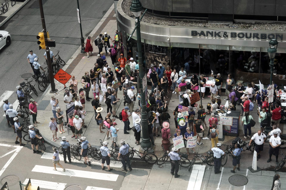 Demonstrators gather outside the Moms for Liberty meeting in Philadelphia, Friday, June 30, 2023. (AP Photo/Matt Rourke)