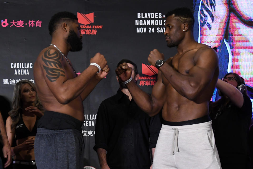 Curtis Blaydes (L) and Francis Ngannou face off during the UFC Fight Night weigh-in on Nov. 23, 2018 in Beijing, China. (Getty Images)