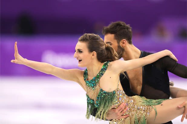 French Skater's Breast Pops Out During Mid-Routine Olympic