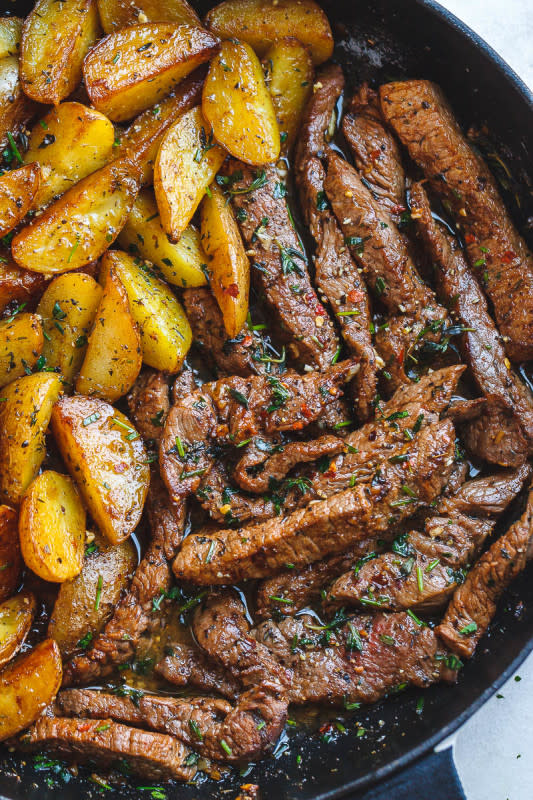 <p>Eat Well 101</p><p>Juicy steak and crisp-golden potatoes are pan-seared and cooked to perfection with a luscious garlic, herbs and butter sauce.</p><p><strong>Get the recipe: <a href="https://www.eatwell101.com/garlic-butter-steak-and-potatoes-recipe" rel="nofollow noopener" target="_blank" data-ylk="slk:One-Pan Garlic Butter Steak and Potatoes;elm:context_link;itc:0;sec:content-canvas" class="link ">One-Pan Garlic Butter Steak and Potatoes</a></strong></p>