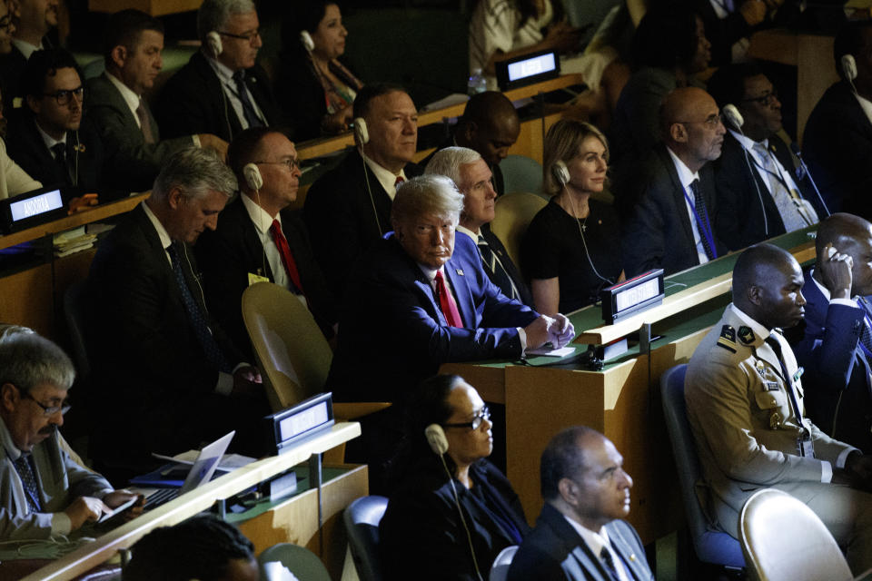 President Donald Trump listens during the the United Nations Climate Action Summit during the General Assembly, Monday, Sept. 23, 2019, in New York. From left, National security adviser Robert O'Brien, White House chief of staff Mick Mulvaney, Secretary of State Mike Pompeo, Trump, Vice President Mike Pence, and U.S. ambassador to the United Nations Kelly Craft. (AP Photo/Evan Vucci)