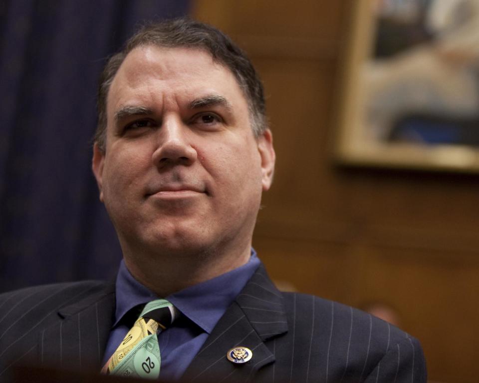 FILE - In this Oct. 1, 2009 file photo, Rep. Alan Grayson, D-Fla. listens during a hearing on Capitol Hill in Washington. Grayson is denying he battered his estranged wife and says a video confirms his account. Grayson issued a statement Wednesday through his attorneys that says his wife, Lolita, was the aggressor during last weekend's confrontation. He says a video recording of their exchange outside the house they once shared backs up his account. Grayson's wife filed for divorce in January, and the central Florida Democrat says he was attempting to visit his children when the incident occurred. (AP Photo/Evan Vucci, File)