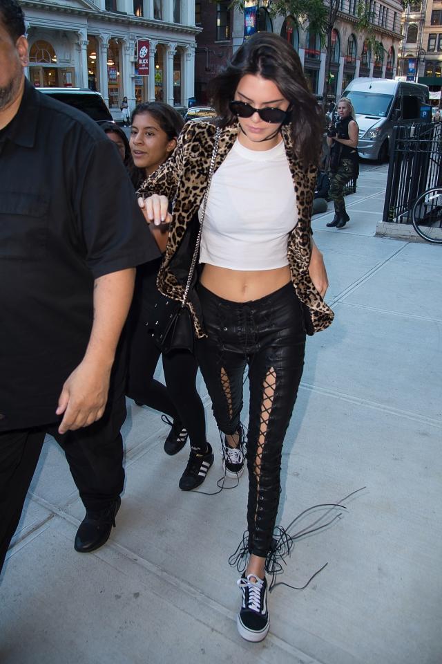 Kylie Jenner in black crop top with black leggings and leather ankle boots  shopping at Sephora on March 18 ~ I want her style - What celebrities wore  and where to buy