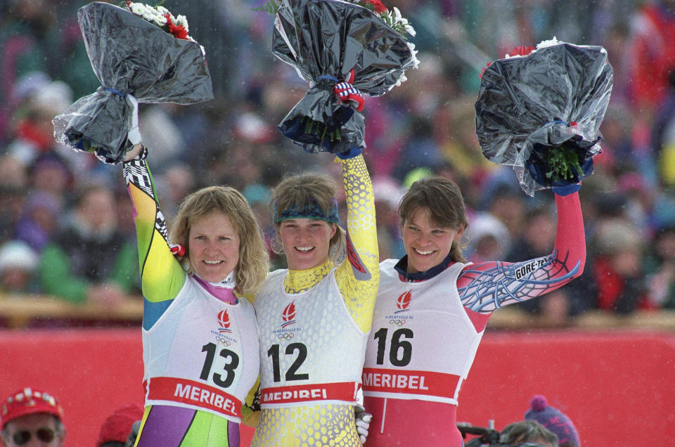 Gold medal winner Kerrin Lee-Gartner of Canada, center, is flanked by the other medalists in the women’s downhill in Meribel, France on Saturday, Feb. 15, 1992. Celebrating with Lee-Gartner are silver medal winner Hilary Lindh of Juneau, Alaska, right, and bronze medal winner of Austria, left. (AP Photo/Rudi Blaha)