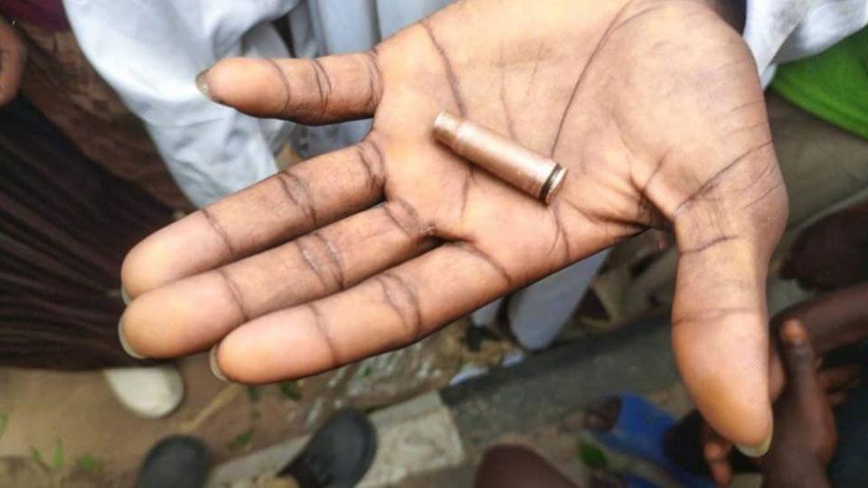 A protester in Kano holding a spent bullet casing - August 1, 2024