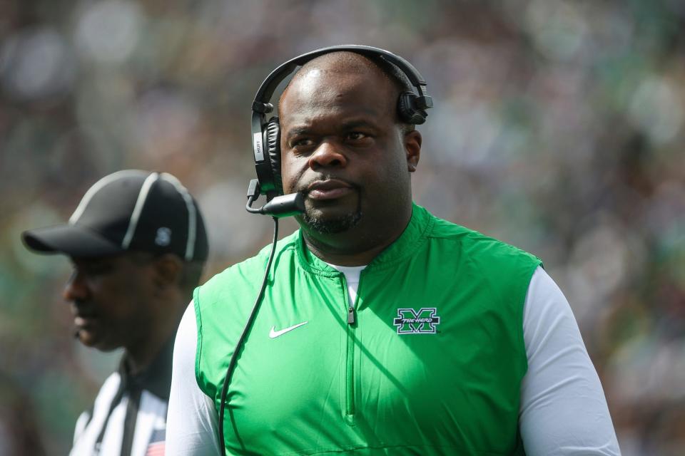 Marshall head coach Charles Huff walks the sideline against Notre Dame during an NCAA college football game Saturday, Sept. 10, 2022, in South Bend, Ind. Marshall won 26-21. (Sholten Singer/The Herald-Dispatch via AP)