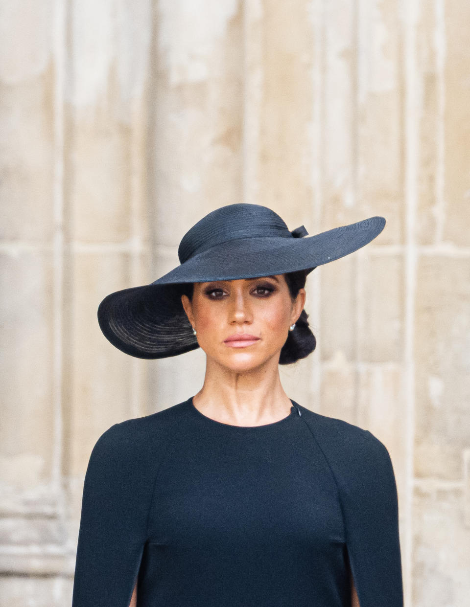 LONDON, ENGLAND - SEPTEMBER 19: Meghan, Duchess of Sussex during the State Funeral of Queen Elizabeth II at Westminster Abbey on September 19, 2022 in London, England. Elizabeth Alexandra Mary Windsor was born in Bruton Street, Mayfair, London on 21 April 1926. She married Prince Philip in 1947 and ascended the throne of the United Kingdom and Commonwealth on 6 February 1952 after the death of her Father, King George VI. Queen Elizabeth II died at Balmoral Castle in Scotland on September 8, 2022, and is succeeded by her eldest son, King Charles III. (Photo by Samir Hussein/WireImage)