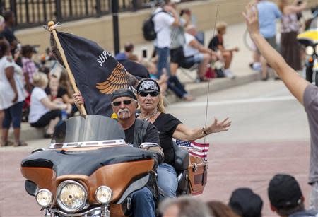 Harley riders participate in the Harley Davidson 110th Anniversary Celebration parade in Wisconsin Avenue, Milwaukee August 31, 2013. REUTERS/Sara Stathas