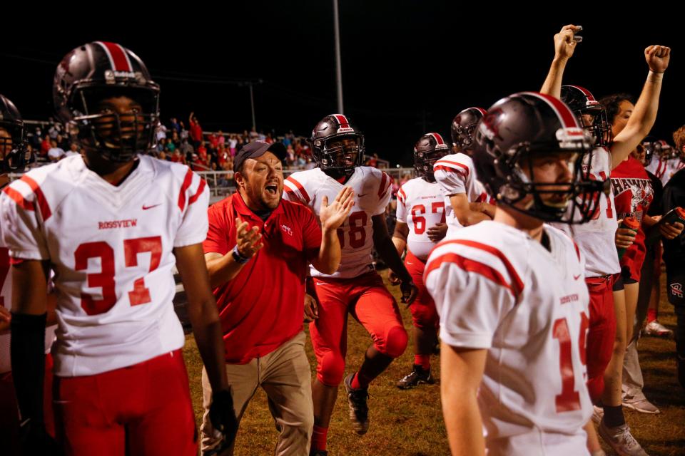 Rossview players cheer on the sideline after a long run in a TSSAA football game between the Kenwood Knights and Rossview Hawks at Kenwood High School in Clarksville, Tenn., on Thursday, Oct. 7, 2021. 