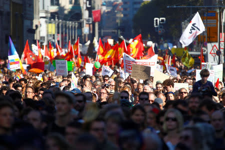 Protesters gather to the "#unteilbar", demonstration which aims to "rise up against discrimination, poverty, racism, sexism, disenfranchisement, and nationalism" in Berlin, Germany, October 13, 2018. REUTERS/Michele Tantussi