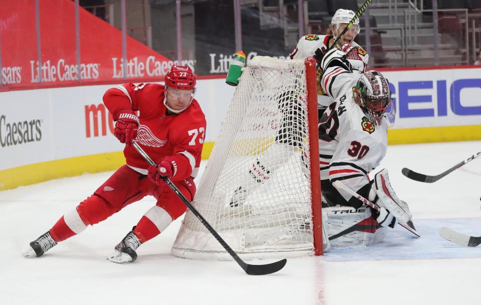 Detroit Red Wings left wing Adam Erne (73) shoots against Chicago Blackhawks goaltender Malcolm Subban (30) on Saturday, April 17, 2021, at Little Caesars Arena in Detroit.