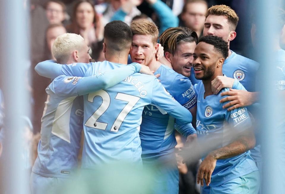 Kevin De Bruyne leads the celebrations as City took a big step towards another Premier League title (Martin Rickett/PA) (PA Wire)