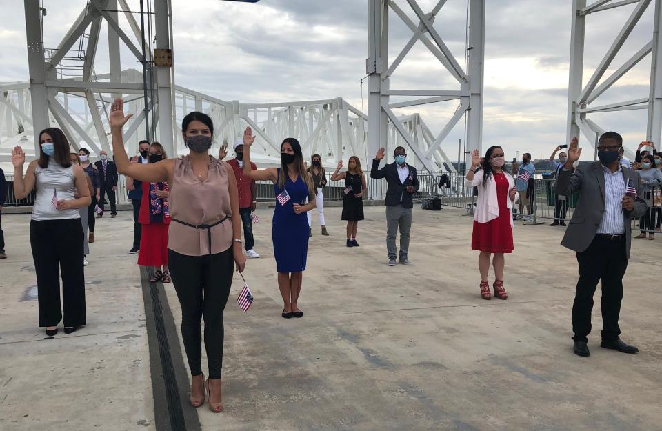 Fifty-one people from 24 countries take the Oath of Allegiance in November 2020 in Jacksonville.