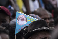 Well-wishers wait for Pope Francis in Kinshasa, Congo, Tuesday Jan. 31, 2023. Francis is in Congo and South Sudan for a six-day trip, hoping to bring comfort and encouragement to two countries that have been riven by poverty, conflicts and what he calls a "colonialist mentality" that has exploited Africa for centuries. (AP Photo/Samy Ntumba Shambuyi)