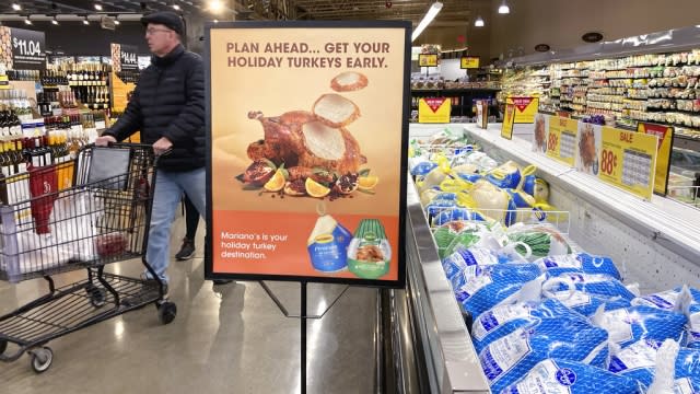 A man shops at a grocery store in Glenview, Ill.