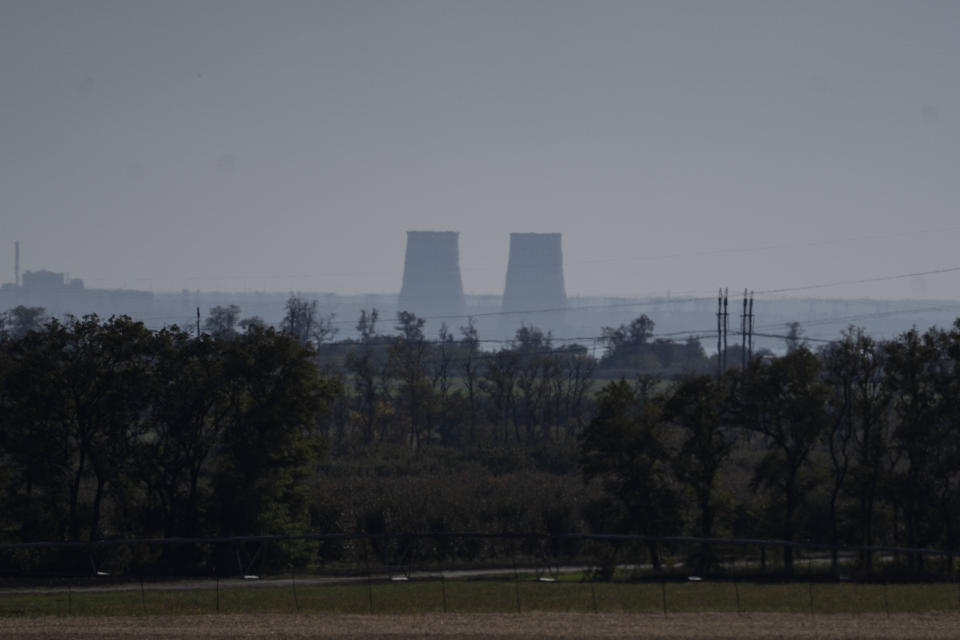 Zaporizhzhia nuclear power plant is seen from around twenty kilometers away in an area in the Dnipropetrovsk region, Ukraine, Monday, Oct. 17, 2022. (AP Photo/Leo Correa)